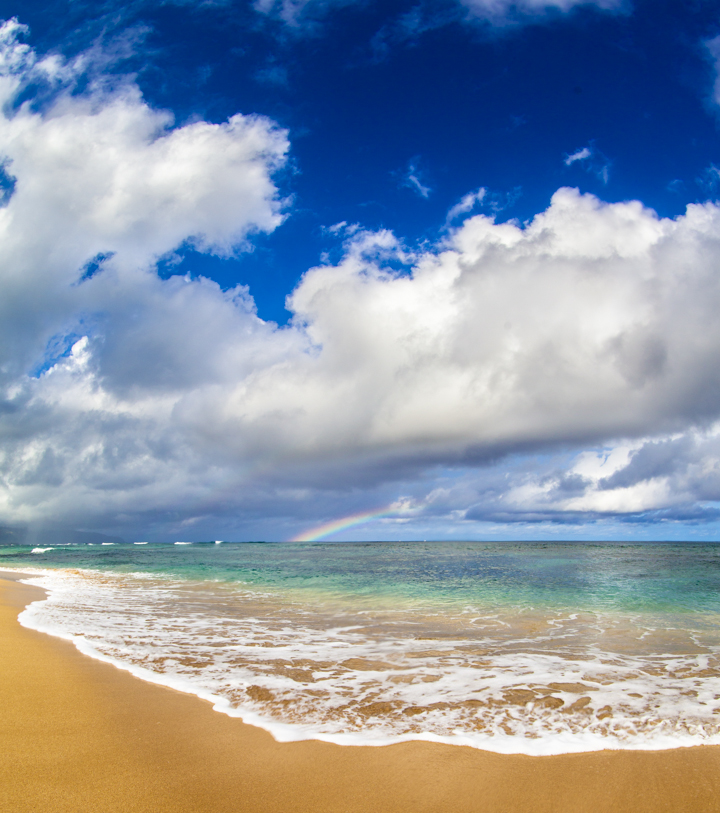 A rainbow off of Sunset Beach on Oahu's North Shore.